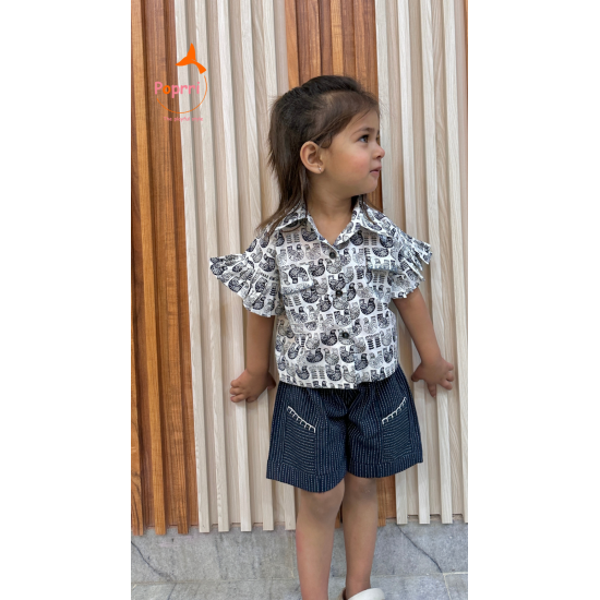 Printed shirt and striped shorts